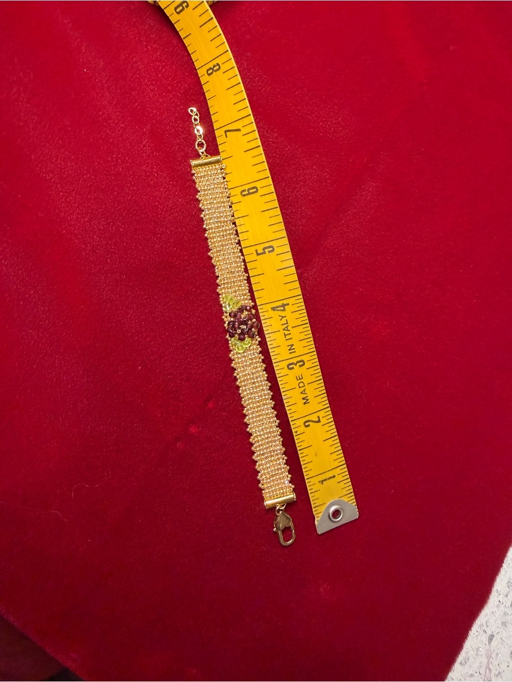 Hand woven gold color seed bead bracelet with garnet and crystal floral accent - Picture 7 of 8